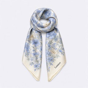 A floral silk scarf labelled Lumière