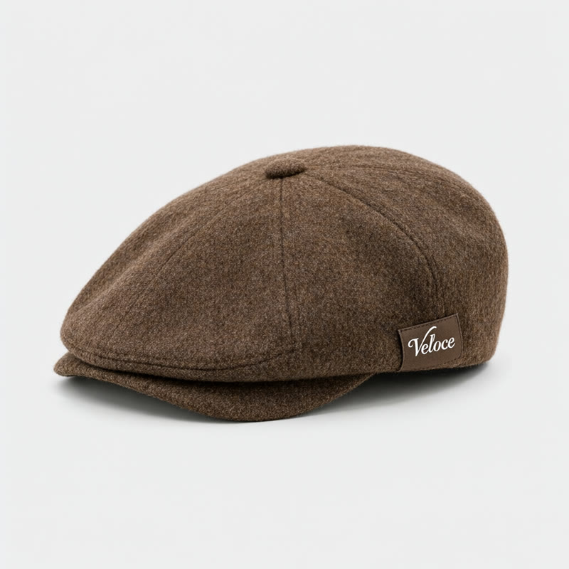 The product shot that went in, a brown wool flat cap labelled Veloce